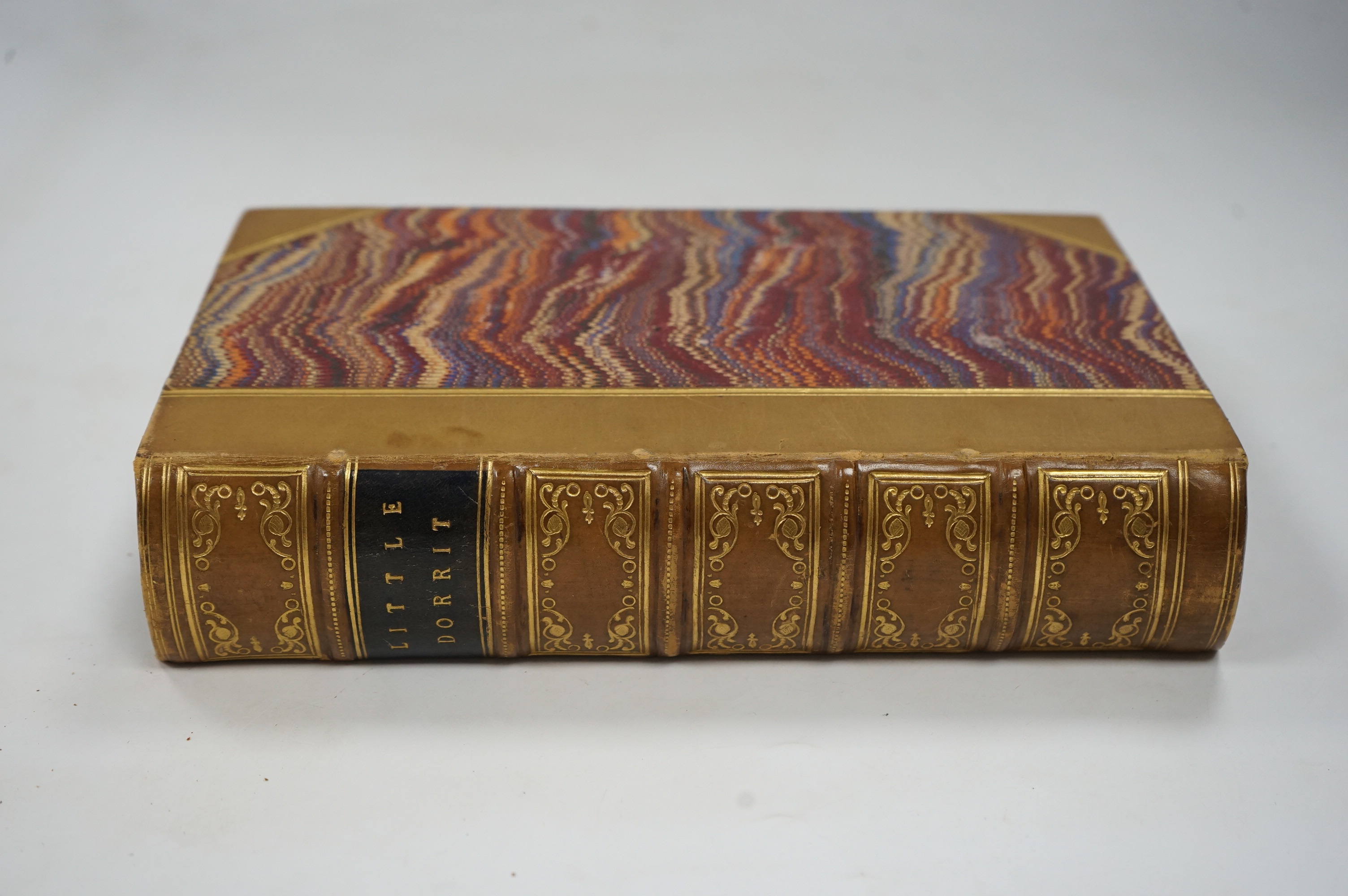 Dickens, Charles - The Mystery of Edwin Drood. First Edition. portrait (of the author), pictorial engraved and printed titles, and 12 plates (by S.L. Fildes); old calf and marbled boards, gilt decorated panelled spine wi